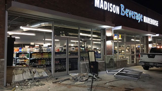 Man Charged After Crashing Into Businesses