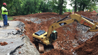 Crews Work To Repair Clarksville Sinkhole