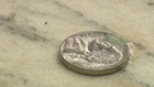 Learn What Coins On Soldiers' Tombstones Mean