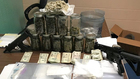 Heroin, Weapons Seized; 21-Year-Old Arrested
