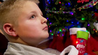 Teen stuffs stockings for the homeless